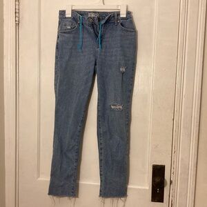 Ripped blue mom jeans